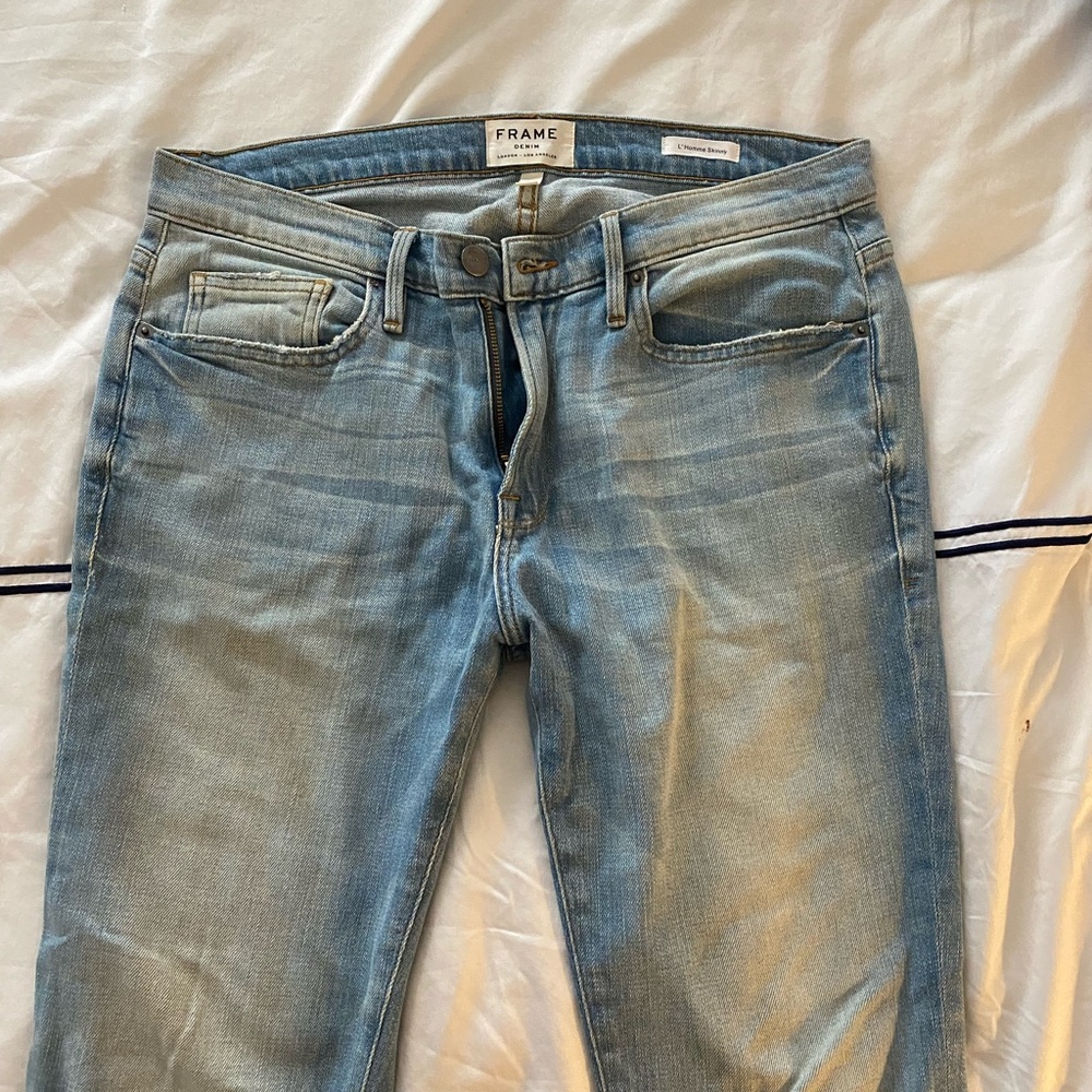 Frame light wash denim jeans in size 32.